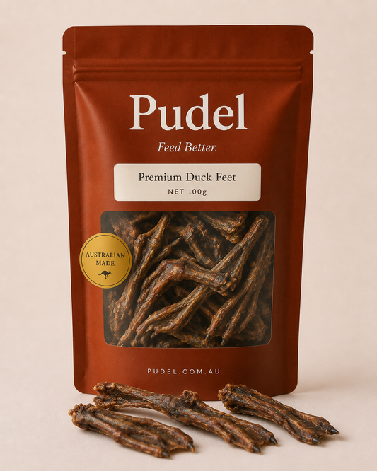 Pudel air-dried duck feet for dogs on linen